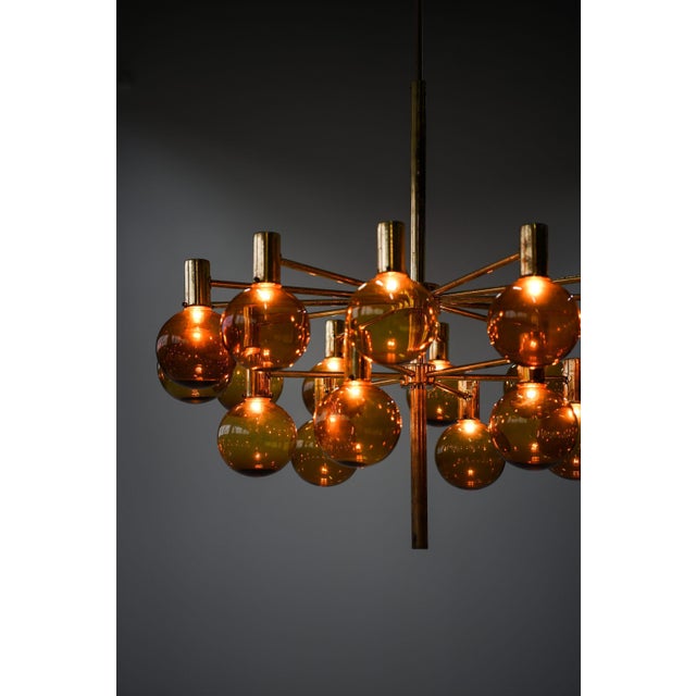 Metal Large Chandelier in Brass and Amber Glass attributed to Hans-Agne Jakobsson, 1950s For Sale - Image 7 of 11