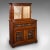 This is an antique secretaire sideboard. An English, mahogany drop-front correspondence cabinet, dating to the late...