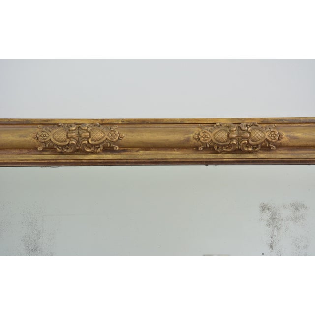 Hollywood Regency Regency Gilded Overmantel Mirror with Lightly Foxed Glass For Sale - Image 3 of 17