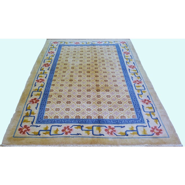 Vintage Chinese Art Deco hand knotted rug with natural colors and fine weave.