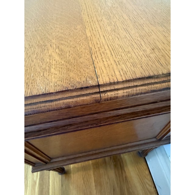 Beautifully crafted vintage oak desk that balances timeless elegance with practical function. Featuring a classic kidney-...