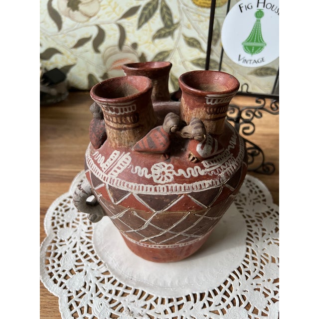 Up for consideration is a beautiful vintage hand made pottery vase with bird details. This would look lovely in your home...