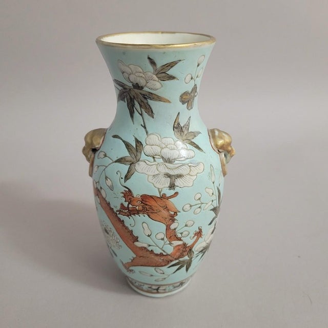 Antique Chinese porcelain vase dating to the late Qing Dynasty, decorated en grisaille and in colored enamels on a...