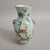 Antique Chinese porcelain vase dating to the late Qing Dynasty, decorated en grisaille and in colored enamels on a...