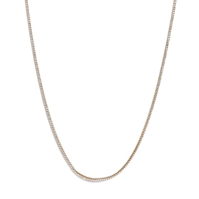 Encircle your neck in the timeless elegance of this 14K yellow gold tennis necklace, a piece that marks the pinnacle of...