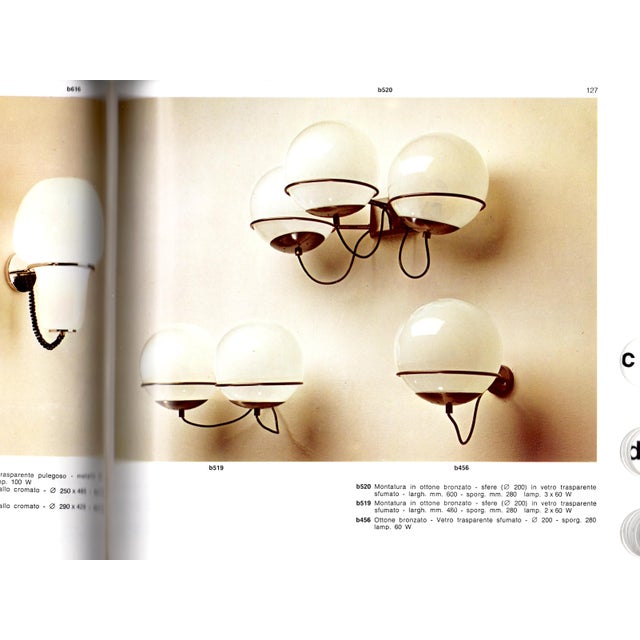 This pair of 2-lights sconces (mod. B519) was produced in Italy around the 1960s by Candle. The are made from a bronzed...