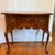 Hekman Queen Anne Lowboy Burled wood with brass hardware in a traditional dressing table/low boy. Minimal age appropriate...
