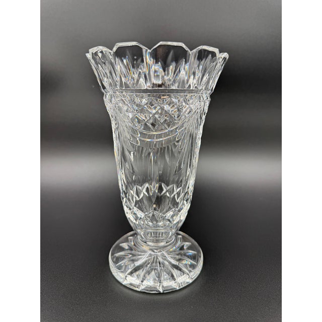 This Waterford Society crystal vase from 1995 exemplifies the brand’s timeless craftsmanship and elegant design. The vase...