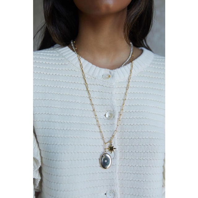 This is part of Chairish’s Costume Jewelry assortment. Our Locket + Star Compass Necklace is a subtle yet captivating...
