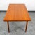 This is an excellent restored teak dining table, made in Denmark. It features two extendable draw leaves, that pull out to...
