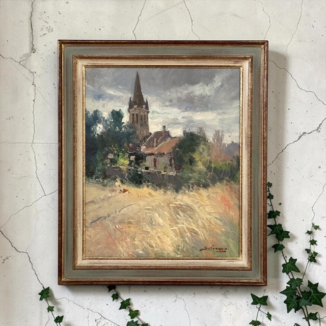 A peaceful view of a village along the Saulx River in the Meuse region of northeastern France is captured in this...