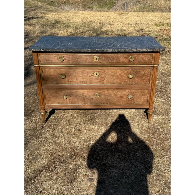 19th Century French Louis XVI Commode from France. Made of solid mahogany, with a marble top, the wood was professionally...