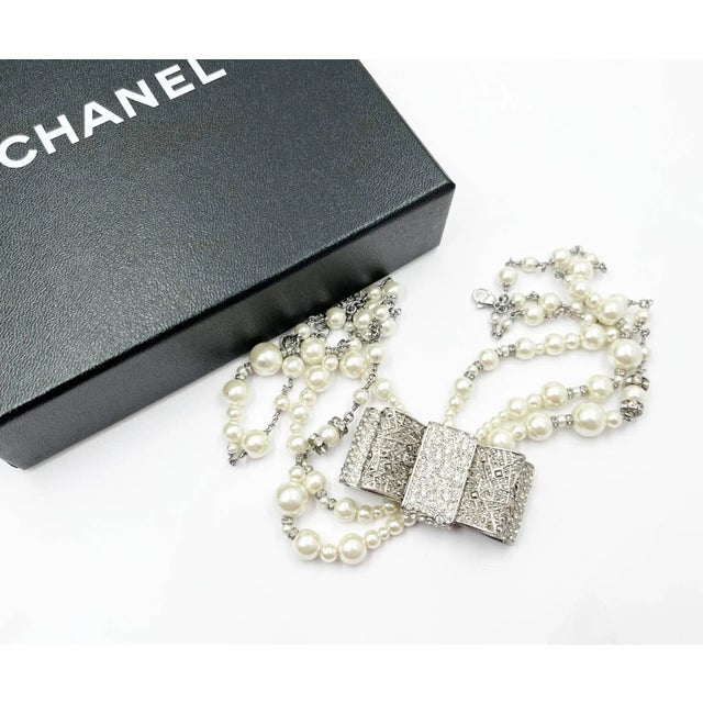 Chanel Rare Silver Large Bow Crystal 3 Strand Pearl Necklace *Marked 13 *Made in France *Comes with original box -The...