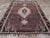 This striking Mid-20th century Turkish Anatolian tribal carpet, measuring 8' 9" x 12' 1", captures the spirit of regional...