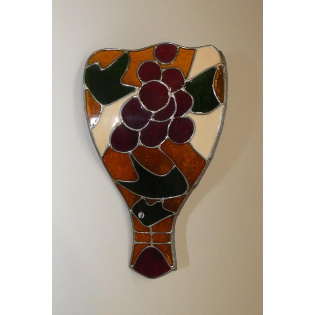 Set of four polycarbonate wall lamps produced in the 1970s by flair. In true tiffany style, they feature a soft iron...
