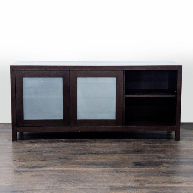 Frosted glass doors slide open to reveal additional shelves. Brand: Crate & Barrel. Dimensions (in): 72W x 18D x 33H.