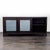 Frosted glass doors slide open to reveal additional shelves. Brand: Crate & Barrel. Dimensions (in): 72W x 18D x 33H.