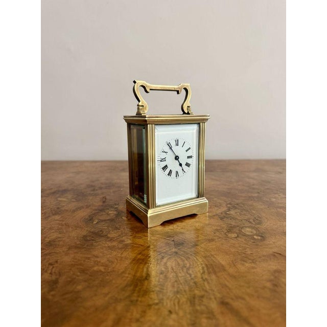 Fine quality antique Edwardian brass carriage clock, having a quality brass carriage clock with a brass case with bevelled...