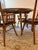 Honey tone, mid-century modern Conant Ball round dining table comes with six chairs and two leaf inserts. Almost certainly...