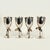 Mid century set of fourteen silver plate on hammered copper goblets featuring stone clad toucans perched in the stems,...