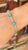 This is part of Chairish’s Fine Jewelry assortment. This Emerald Flower and Diamond Tennis Bracelet in 18K gold showcases...