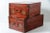 Great set of 2 large Chinese Red embossed leather trunks, the inside is also leather.. Beautiful poriginal patina through...