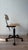 Iconic Kevi desk chair by Danish designer Jorgen Rasmussen, with adjustable teak plywood seat and backrest and 5 star...