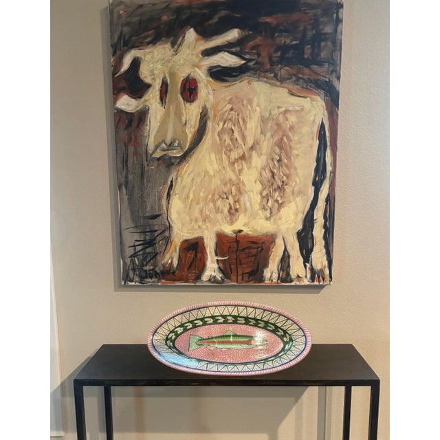 Hand painted and glazed platter (18” long), with a fish design. Signed and dated, August 9, 1992 by the California artist...