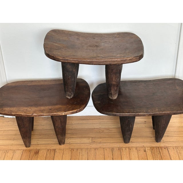This is a set of 3 large authentic old African Senufo stools, hand carved by the Senufo people of West Africa. Each stool...