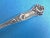 Offered is a beautiful 1909 art nouveau sterling silver teaspoon with deeply sculpted carving on both sides of the handle....