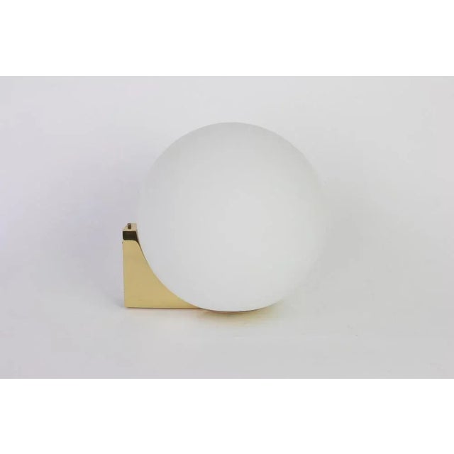 1 of 2 large brass opal glass wall lights, Limburg, Germany, 1970s High quality and in very good condition. Cleaned, well-...