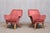 This pair of armchairs was designed by Carl-Gustaf Hiort af Ornäs and produced by his own company, Puunveisto Oy (Wood...
