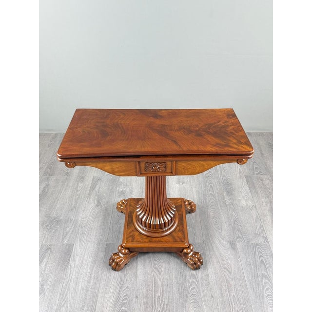 An elegant mahogany games table in the napoleon iii style, dating from the second half of the 19th century. its...