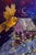 This artwork features a majestic crane cradling a whimsical birdhouse, illuminated by delicate strings of lights. The...