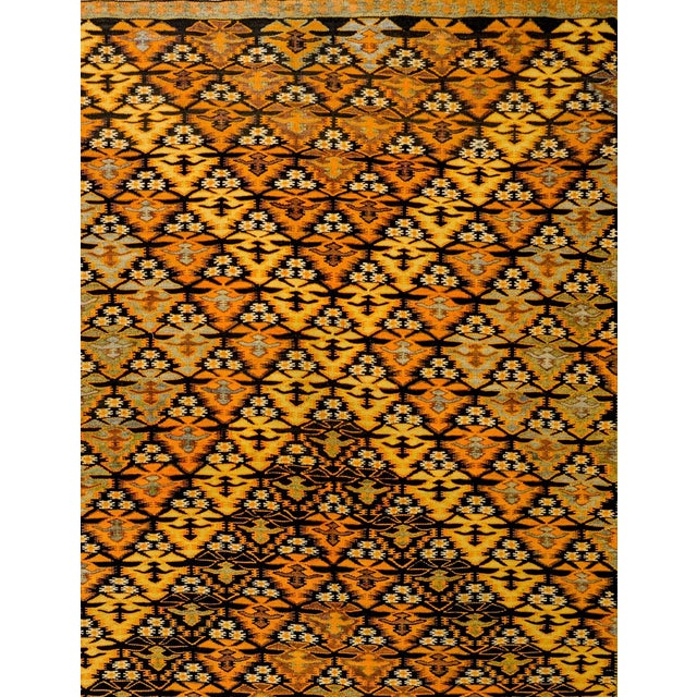 An amazing mid-20th century Persian Qazvin Kilim rug with an all-over tree-of-life pattern woven in such a way that a...