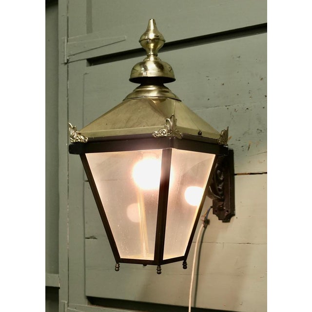 Large Brass Wall Hung Lantern There are three of these old wall lights, the Large Brass Wall Lanterns are made in brass...