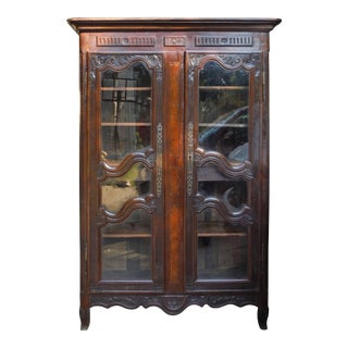 19th Century French Rustic Carved Wood Armoire For Sale