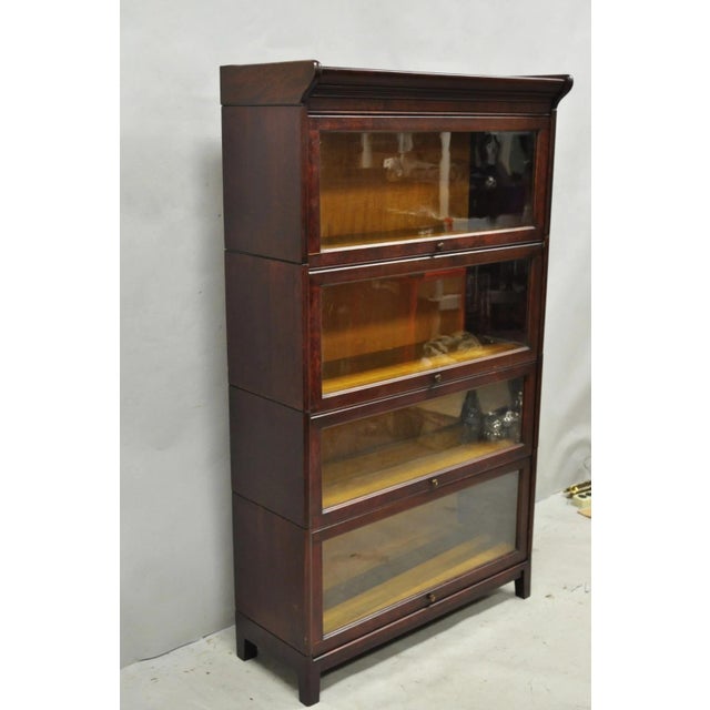 Antique Mahogany 4 Section Barrister Bookcase Glass Door Stacking Lawyers Cabinet. Maker unknown. (3) 13" H and (1) 11" H....