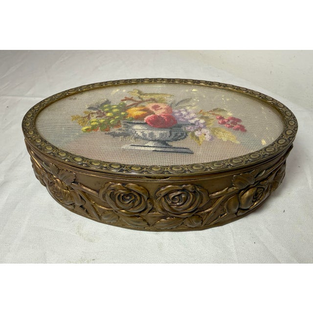 Up for sale is an antique 19th century handmade French petit point lidded bronze dresser jewelry box. This unique piece...