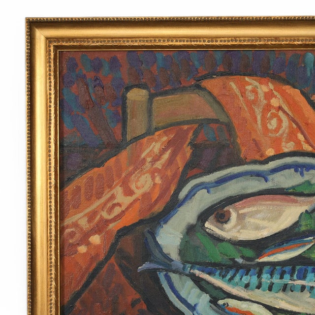 Striking mid century still life oil painting on canvas depicting fresh caught fish in a platter with lemons on a table...