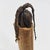 Hand-carved wooden doll from Liberia, featuring a natural raffia fiber skirt. Dolls like this are often made as...