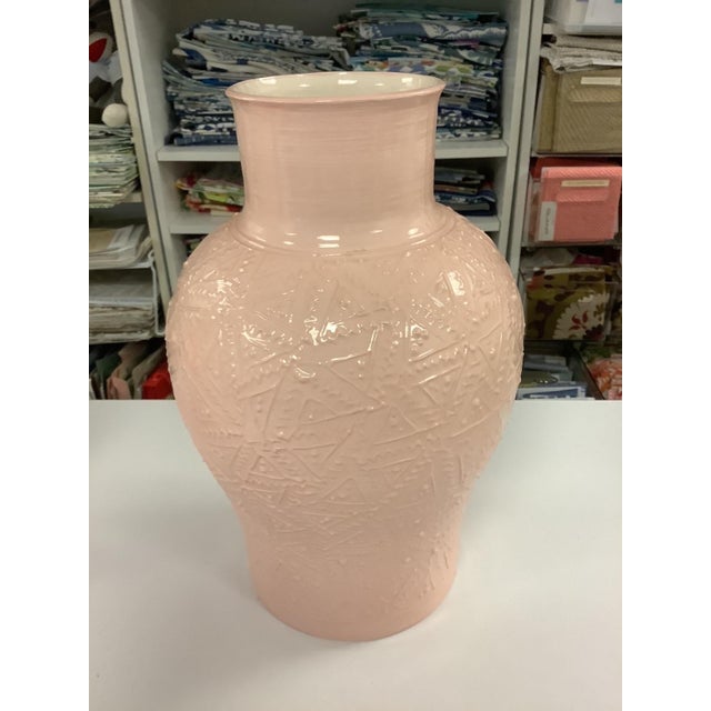 Two Roy Hamilton 16" tall peach vases with decorative geometric relief design.