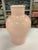 Two Roy Hamilton 16" tall peach vases with decorative geometric relief design.