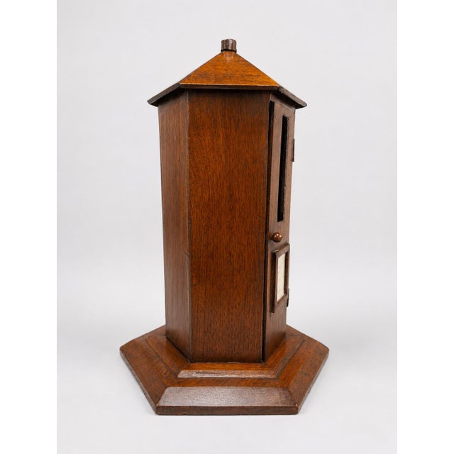 An interesting English mahogany post office box model, likely Circa 1890, fashioned as a hexagonal architectural miniature...