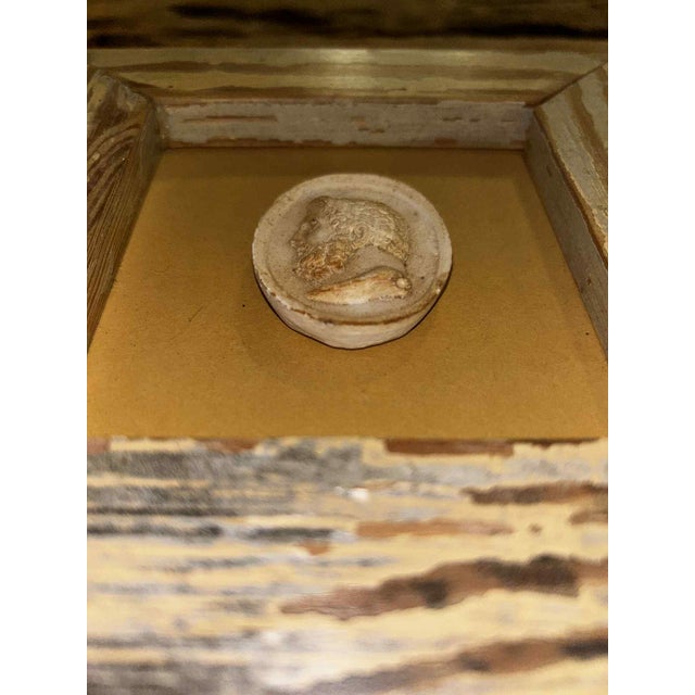 Unearth a direct connection to the classical world with this captivating Italian Plaster of Paris intaglio, presented...