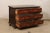 An Italian wooden chest of three drawers from the mid-18th century. This antique chest from Italy has a rectangular-shaped...