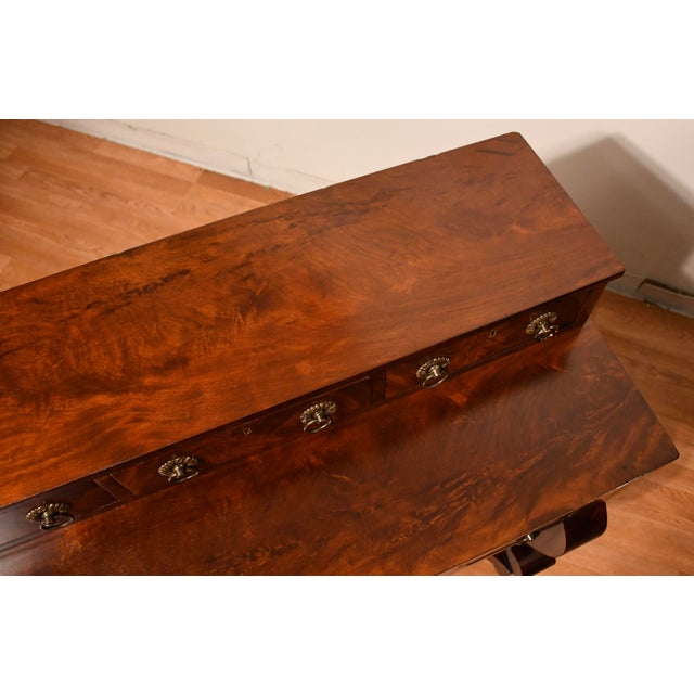 We are pleased to offer this beautiful Antique American Empire Server / Buffet, from the 1890s. This server is made of...
