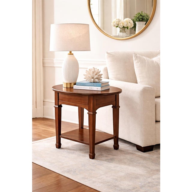 A refined and highly versatile solid wood oval side table, thoughtfully refinished in our signature Old Chapel Satin...