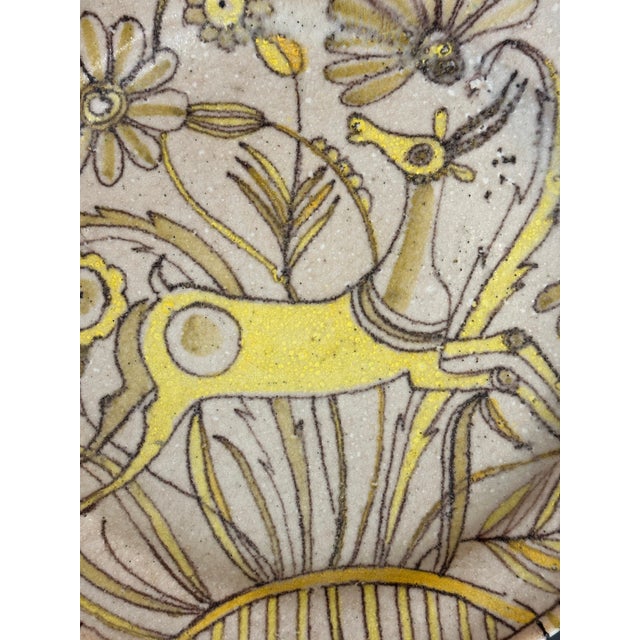 A wonderful impressive Guido Gambone ceramic charger. The decoration is whimsical and the scale of the charger at slightly...