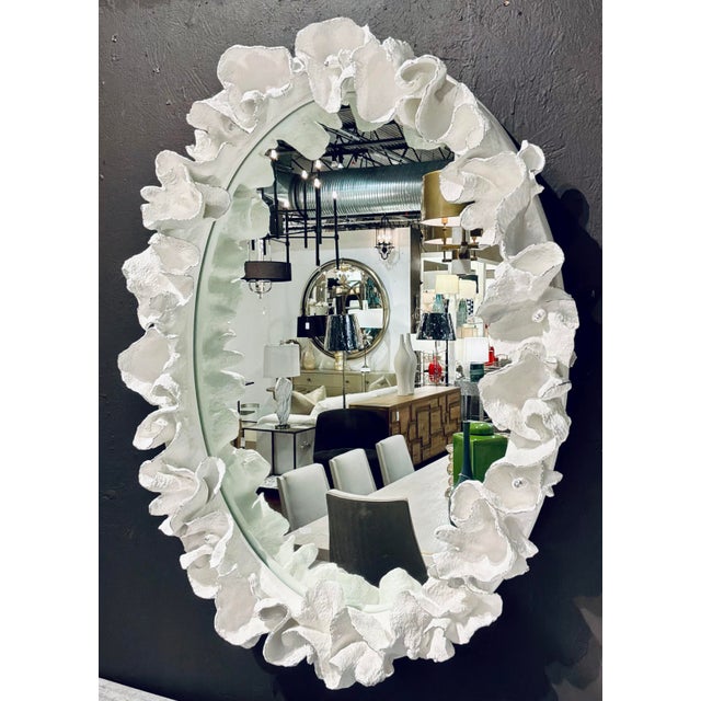 Original retail $5200, stylish Made Goods Organic Modern White and Silver Faux Shell Coco Wall Mirror, showroom floor sample